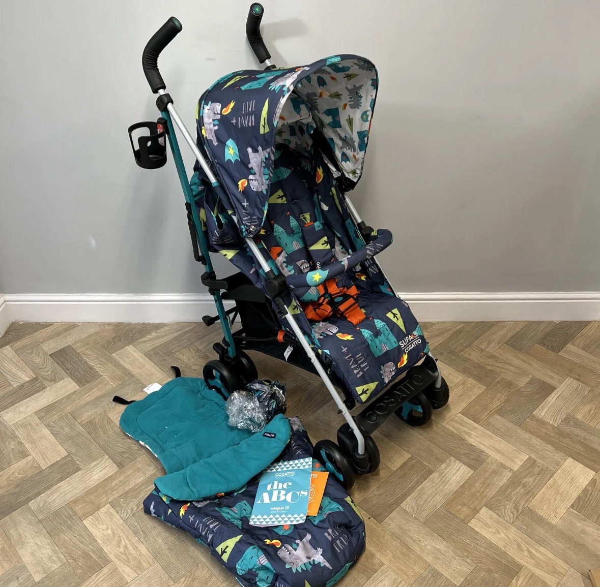 Cosatto sale dragon stroller