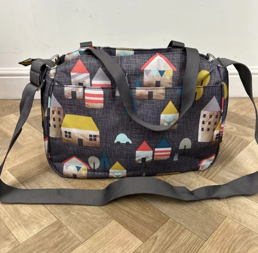 NEW Cosatto Deluxe Changing Bag With Mat - Huggee Houses - Charcoal Grey